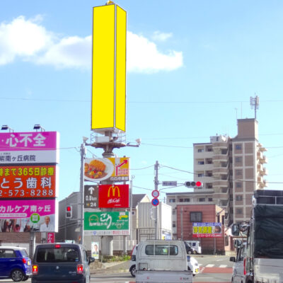 県道31号線・福岡筑紫野線（春日公園入口Ｙ字路）回転広告塔